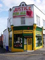 Colour photograph of the exterior of New Roots Café, Spital Hill.