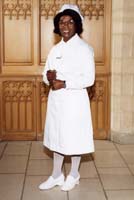 Colour portrait photograph of Collis Beckford holding her nursing qualification.