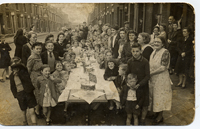 Sepia photograph of the VE day party on Vernon Street.