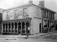 Black and white photograph of the exterior of the Lodge Inn on Spital Hill