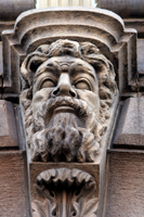 Colour photograph of stone carved head at the front of the Sheffield And District African Caribbean Community Association 