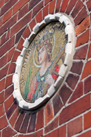 Colour photograph of a mosaic on the exterior front wall of St Catherine's Church