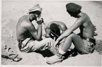 Black and white photograph of David Mowat and colleagues working in the Suez Canal, 1954.