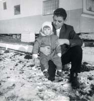 Black and white photograph of Michelle Kusiak as a baby with her father Michael, 1964.