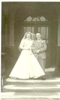 Black and white wedding photograph of Marion Graham and her father, 1955.