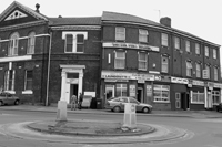 Black and white photograph of the exterior of Al Rahman mosque on Ellesmere Road in 2005