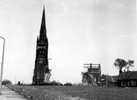 Black and white photograph of the demolition of All Saints Church