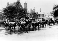 Black and white photograph of a funeral procession