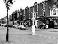 Black and white photograph of the exterior of TSB Bank on Ellesmere Road in 1964