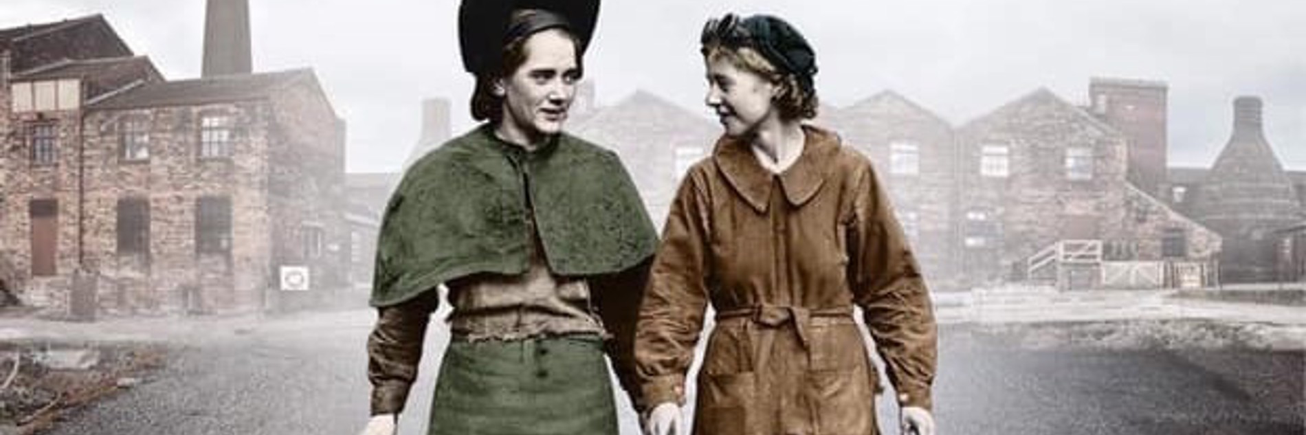 An old second world war photograph of two women walking side by side in conversation. Old factories have been imposed behind them.