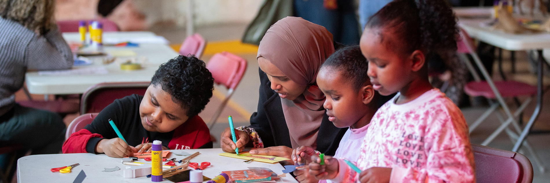 Photograph of visitors at a family workshop