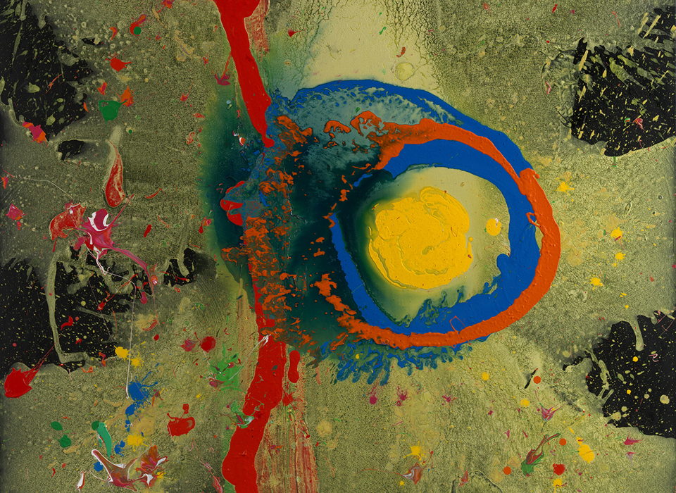 A photograph of John Hoyland's painting Survivor Man. Survivor Man has a black background with a large yellow splash extending out from the centre in all directions. Approx one third into the painting is a vertical red stripe. In the centre, there is a large blue circle, with a smaller yellow circle in the centre. An orange ring goes around the yellow circle. Small splashes of other bright colours are smattered around the rest of the canvas.
