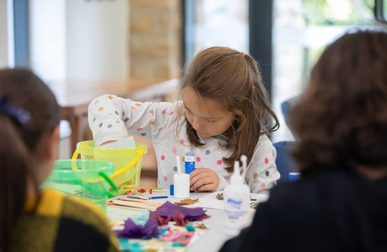 Photograph of a visitor at a family workshop