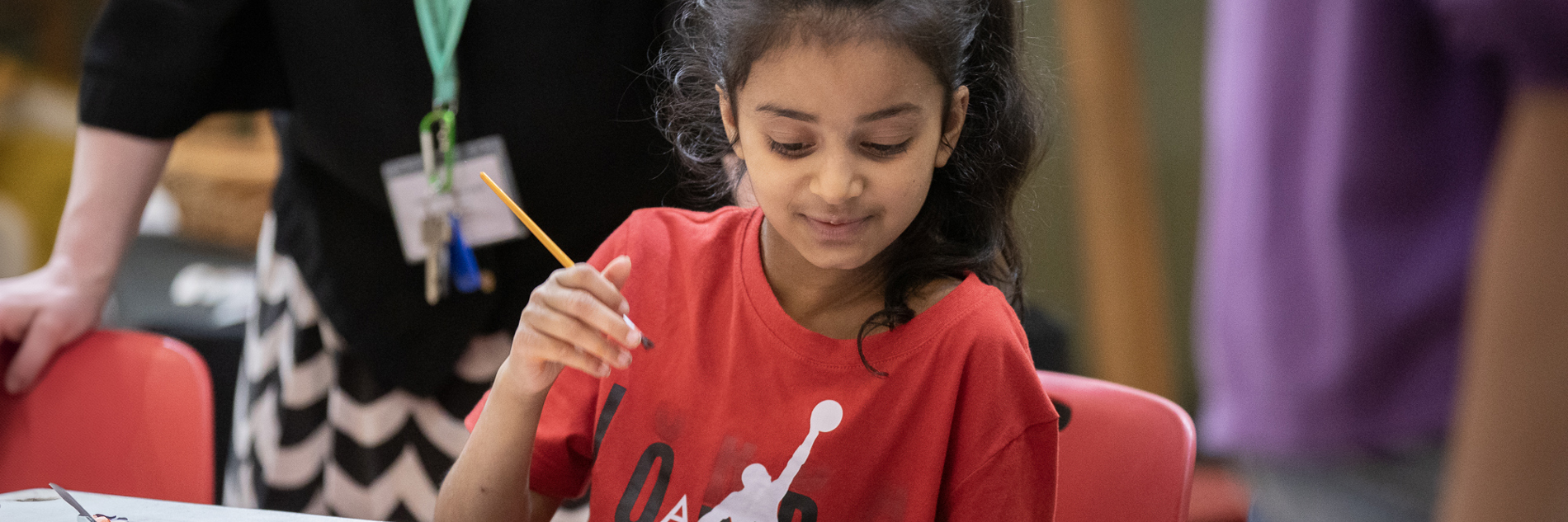 A child taking part in art activities.