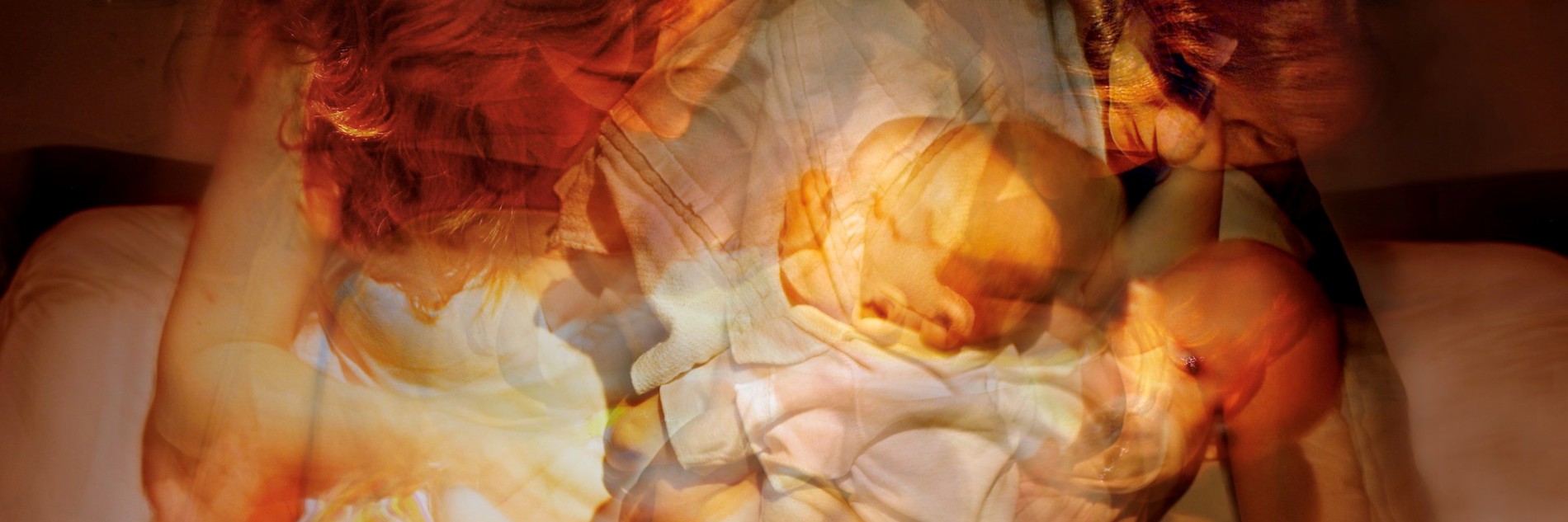 A photograph composed of multiple exposures of a mother and baby.