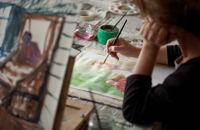 An image of someone doing a watercolour painting. 